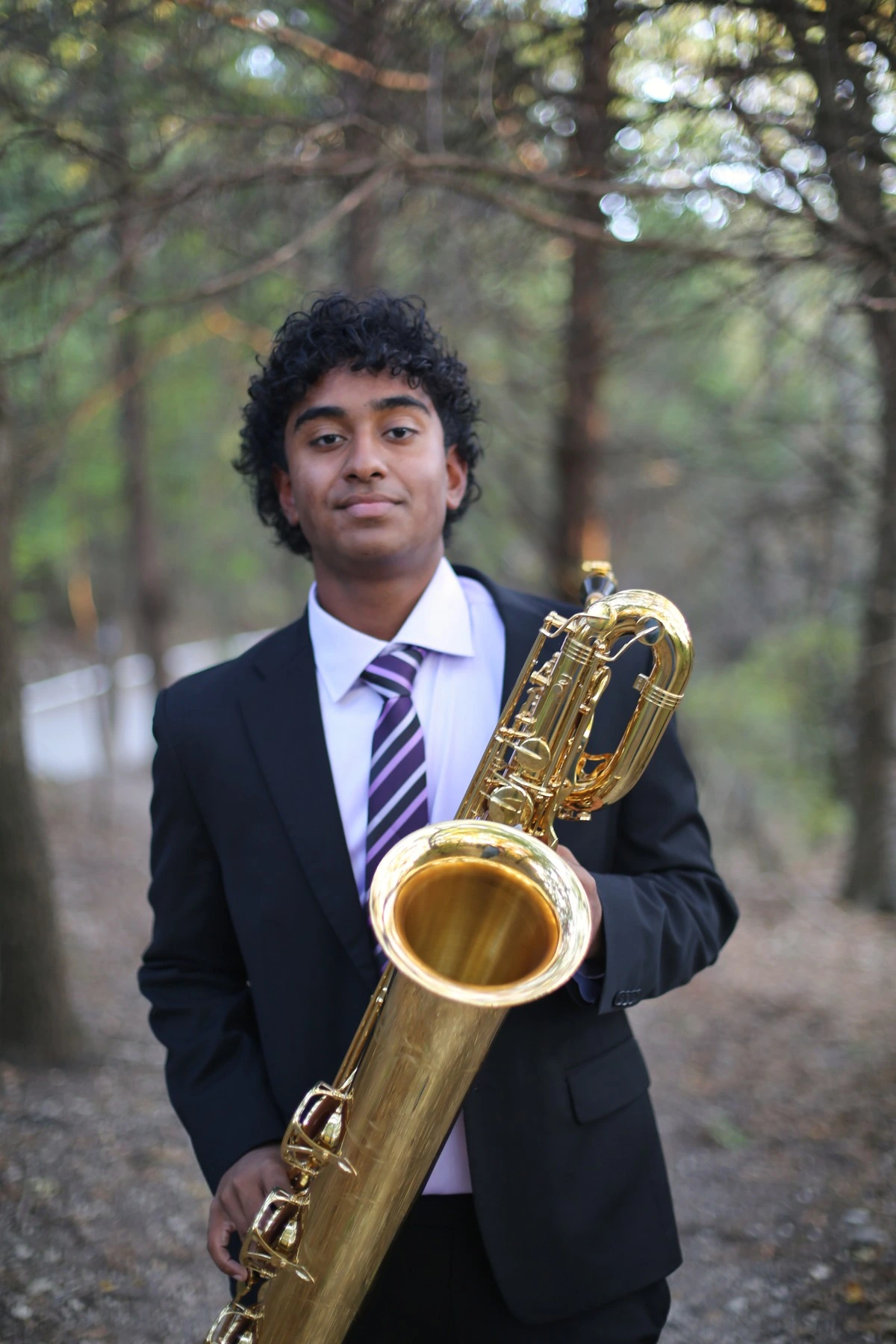 Joe Binil with saxophone