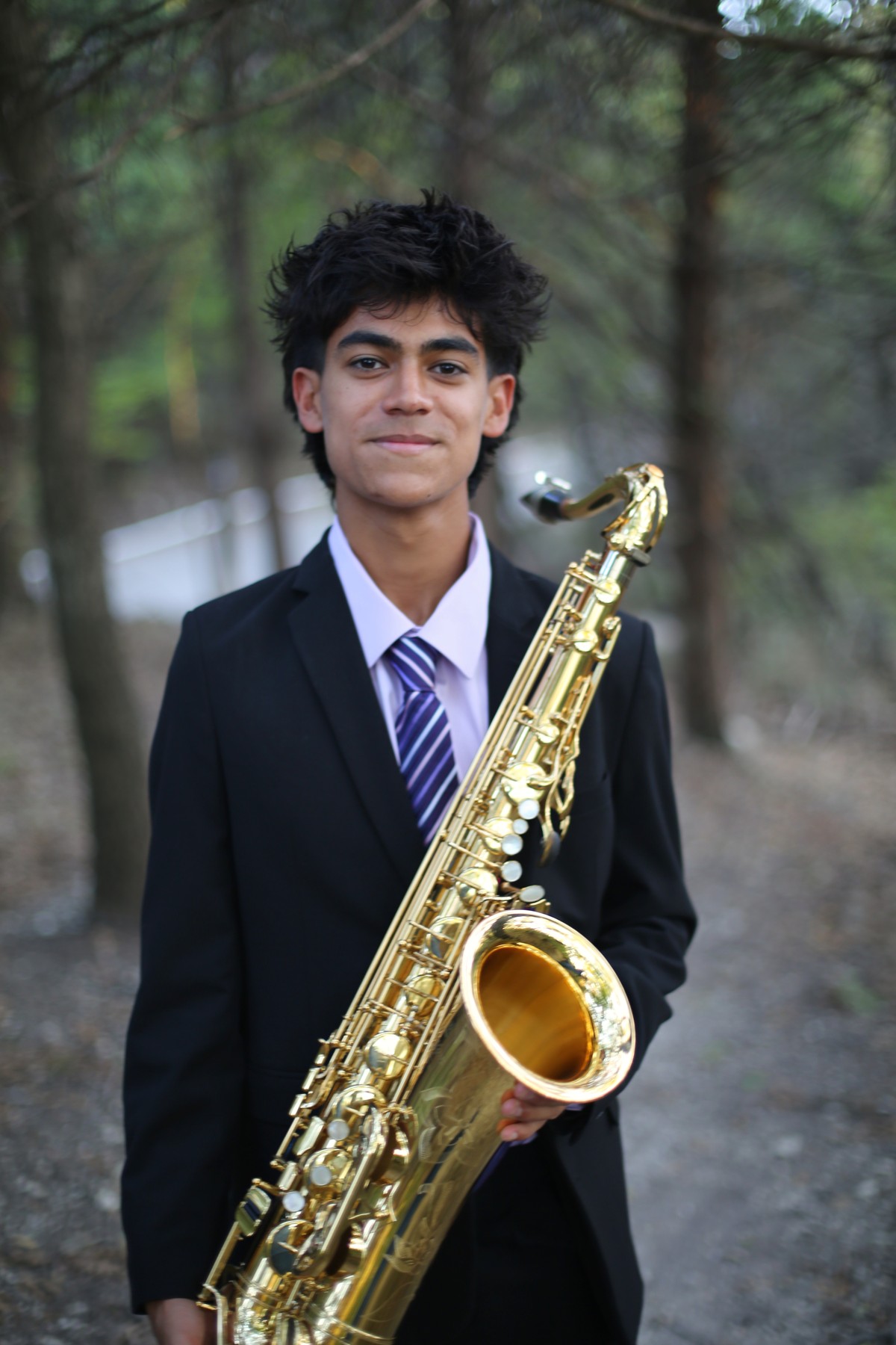 Ayden Garcia with saxophone